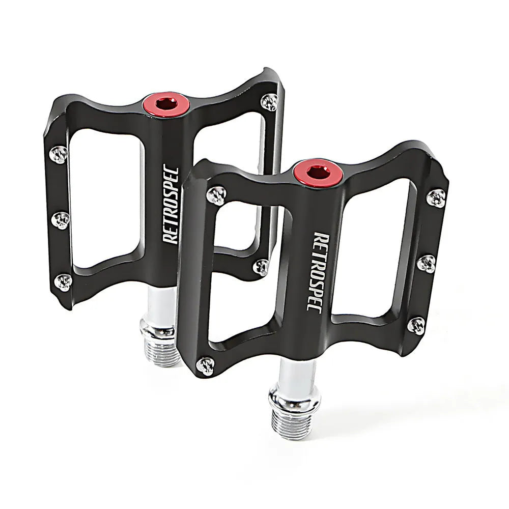 Black CNC aluminium mountain bike pedal with anti-skid nails and sealed bearing, 80x80x18mm