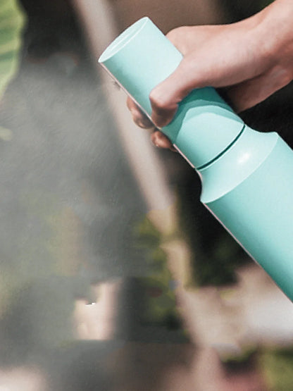 USB rechargeable electric watering kettle sprayer in white, blue, and green