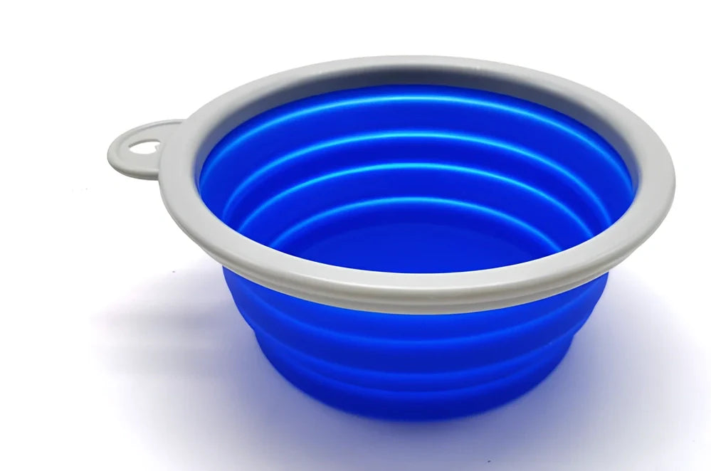 Blue automatic retractable dog leash with 3m extension, ergonomic handle, and folded silicone bowl, 22x16x5.5cm size