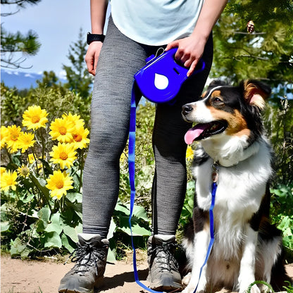 Blue automatic retractable dog leash with 3m extension, ergonomic handle, and folded silicone bowl, 22x16x5.5cm size