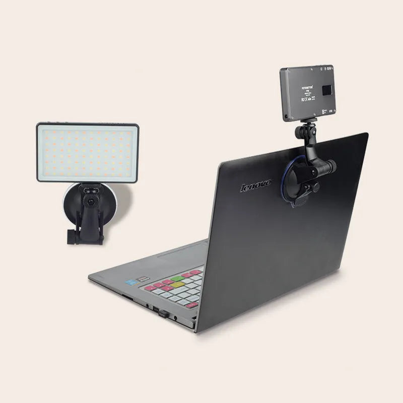 Black aluminium portable LED video light for laptop conferences with a display screen and Type-C port.