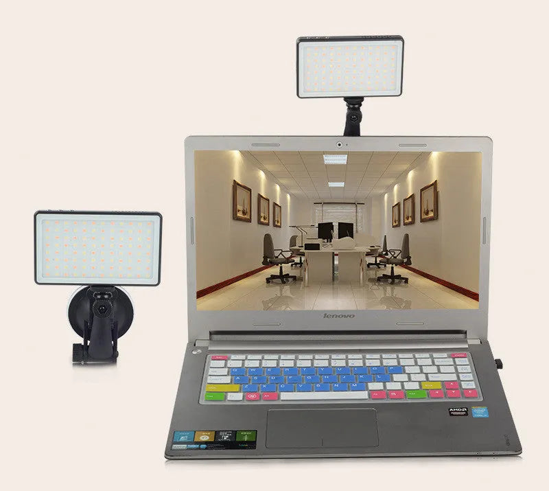 Black aluminium portable LED video light for laptop conferences with a display screen and Type-C port.