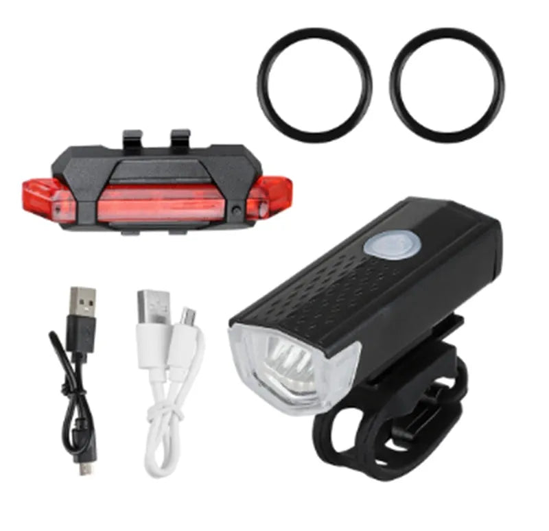 USB rechargeable bicycle front light in black with handlebar mount and charging indicator