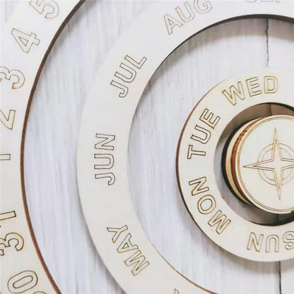 Modern wooden wall calendar with circular rotating design in white