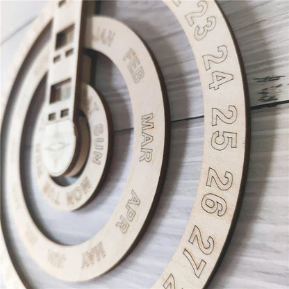 Wooden wall calendar with a smooth, circular rotating design that displays the current date, month, and day