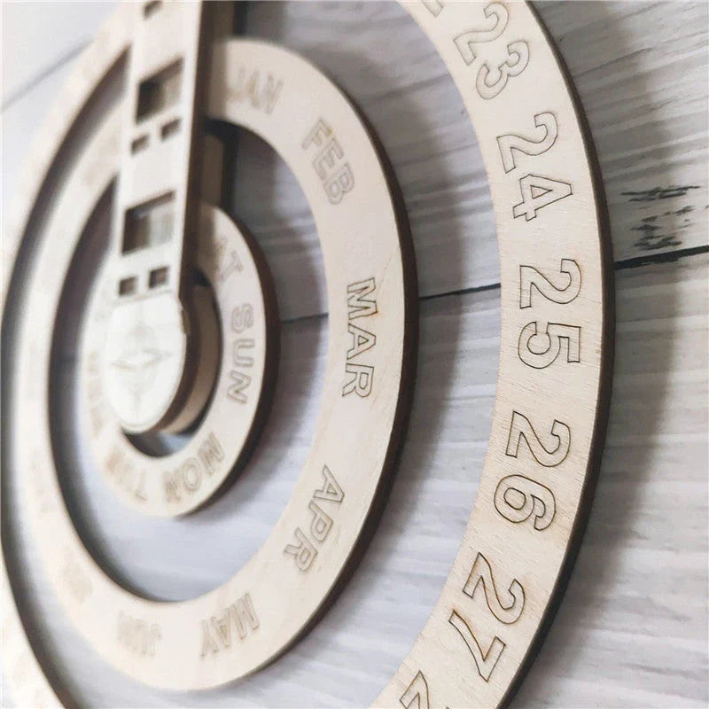 Modern wooden wall calendar with circular rotating design in white