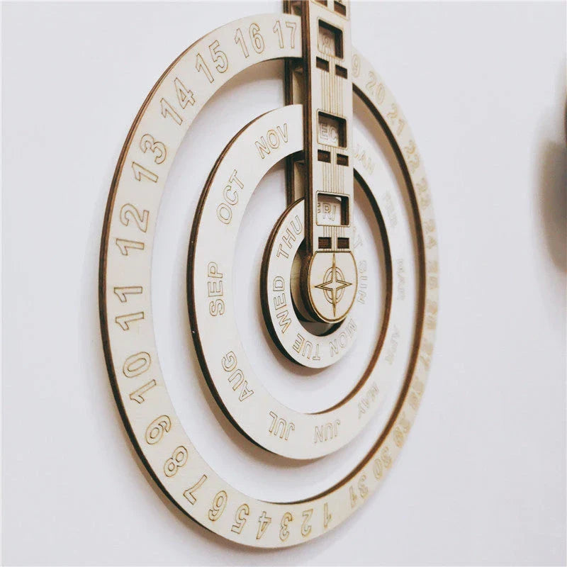 Wooden wall calendar with a smooth, circular rotating design that displays the current date, month, and day
