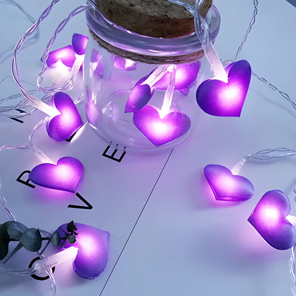 Pink battery-operated LED fairy string lights draped decoratively