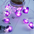 Pink battery-operated LED fairy string lights draped decoratively