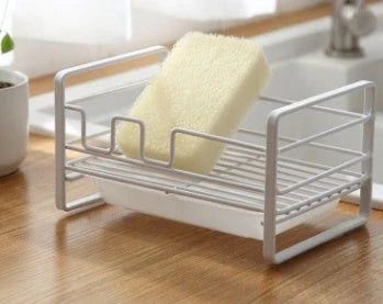 White iron kitchen drying rack with detachable drain pan for sponges and brushes
