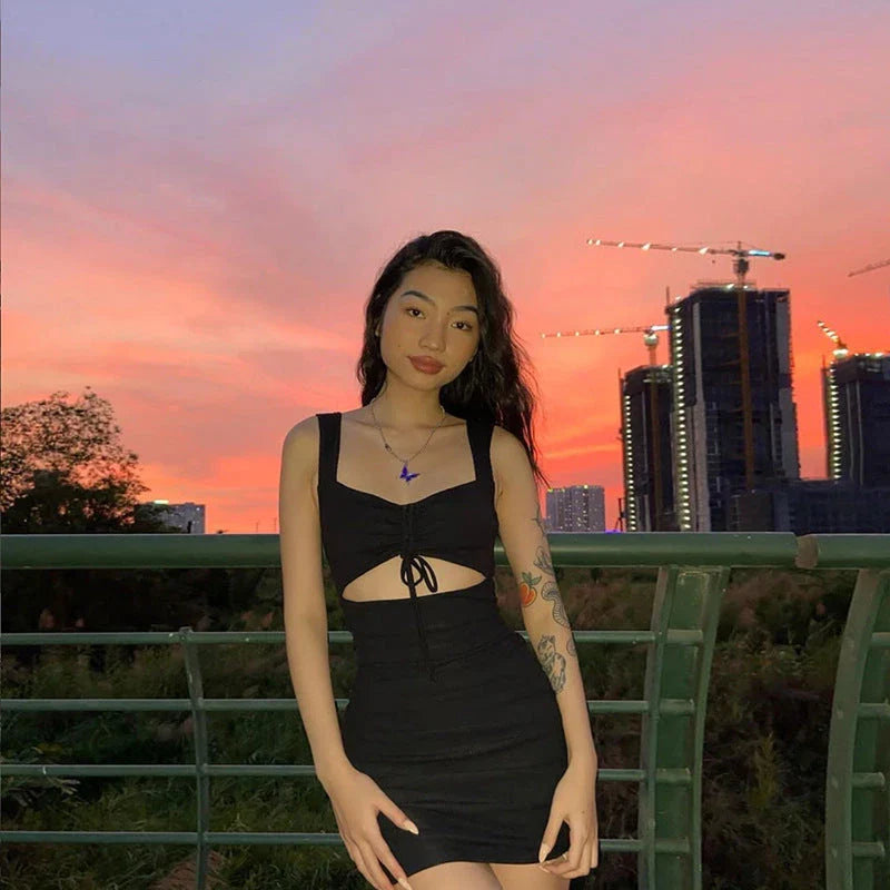 Elegant backless maxi dress with a slit hem, perfect for special occasions and formal events