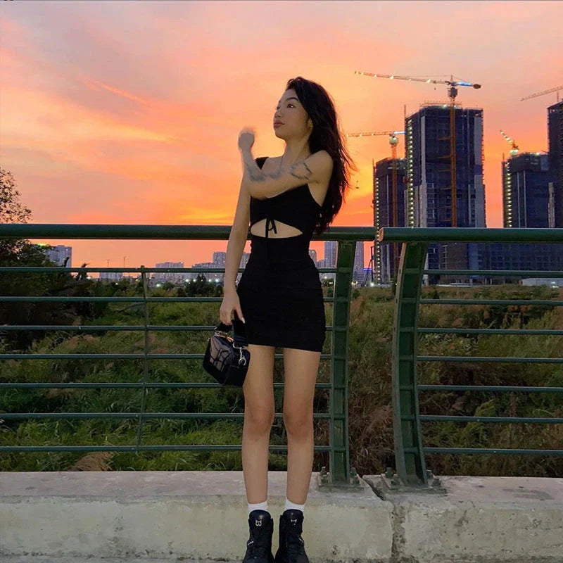 Elegant backless maxi dress with a slit hem, perfect for special occasions and formal events