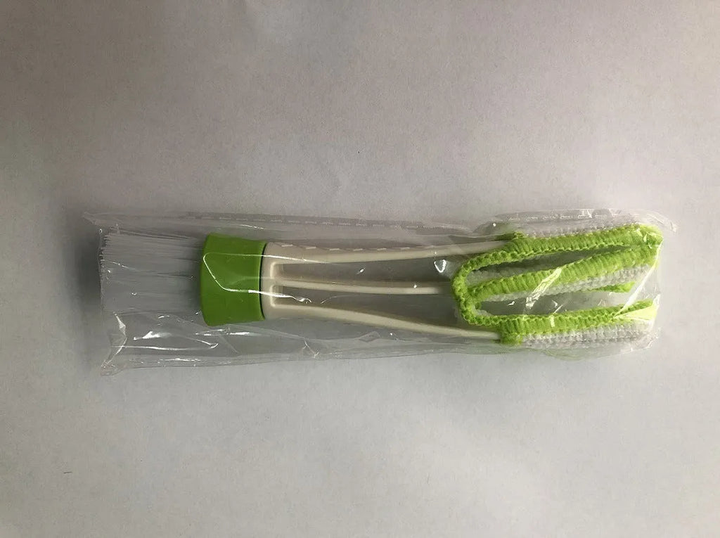 Green ABS dust removal brush with soft bristles and microfiber cover for car air vent cleaning