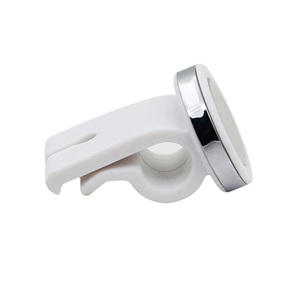 Mini white magnetic car phone holder clipped on car air vent showing compact 3cm size