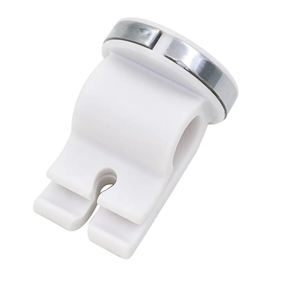 Mini white magnetic car phone holder clipped on car air vent showing compact 3cm size