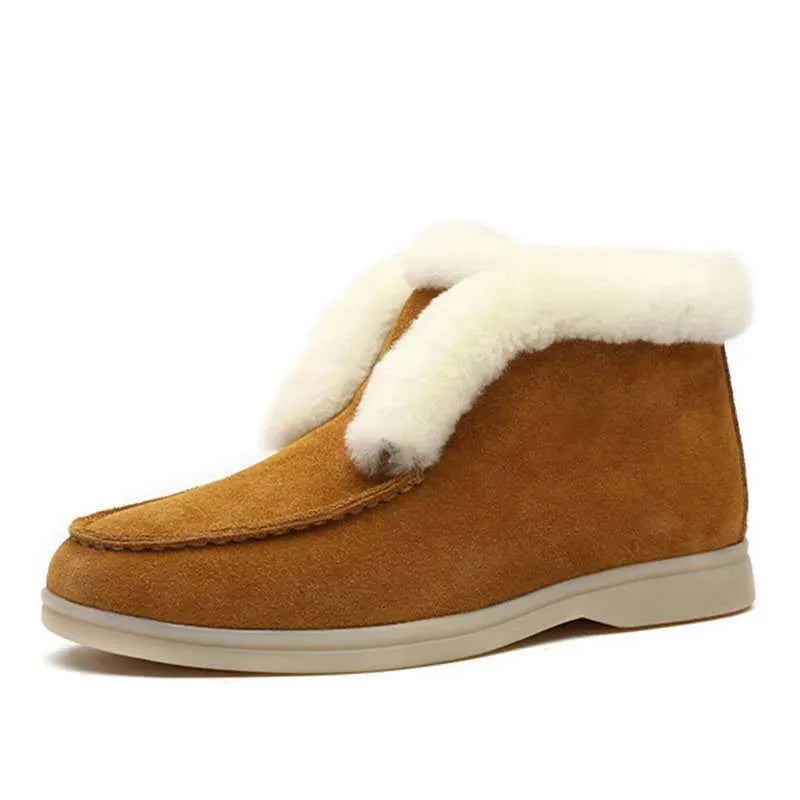 Women's round toe suede Martin boots in beige with rubber sole on a neutral background