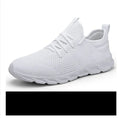 Men's black and white casual jogging shoes with mesh upper and lace-up closure