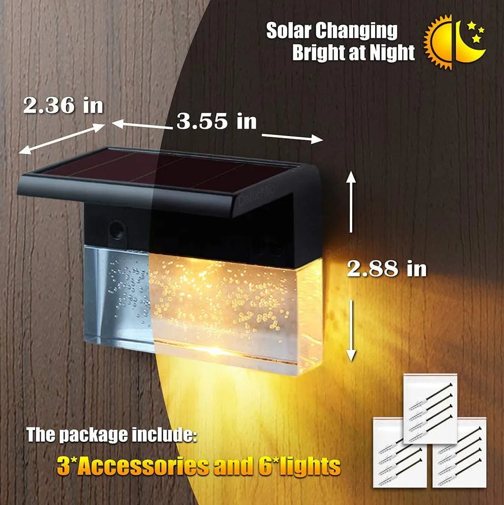 IP65 waterproof solar step light with crystal-like amber cover and RGB LED on a garden path