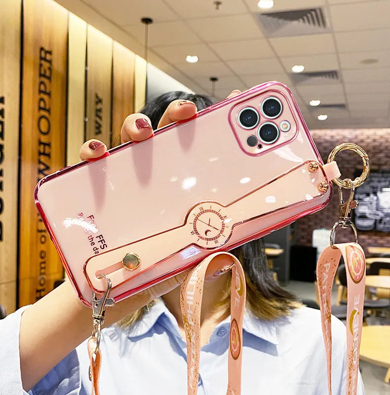 Electroplated TPU mobile phone case with wristband in pink for iPhone, all-inclusive back cover with precise cutouts