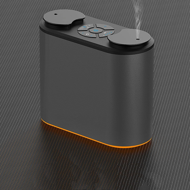 Rechargeable Double Sprinkler Essential Oil Expander in gun color, compact and efficient for large rooms