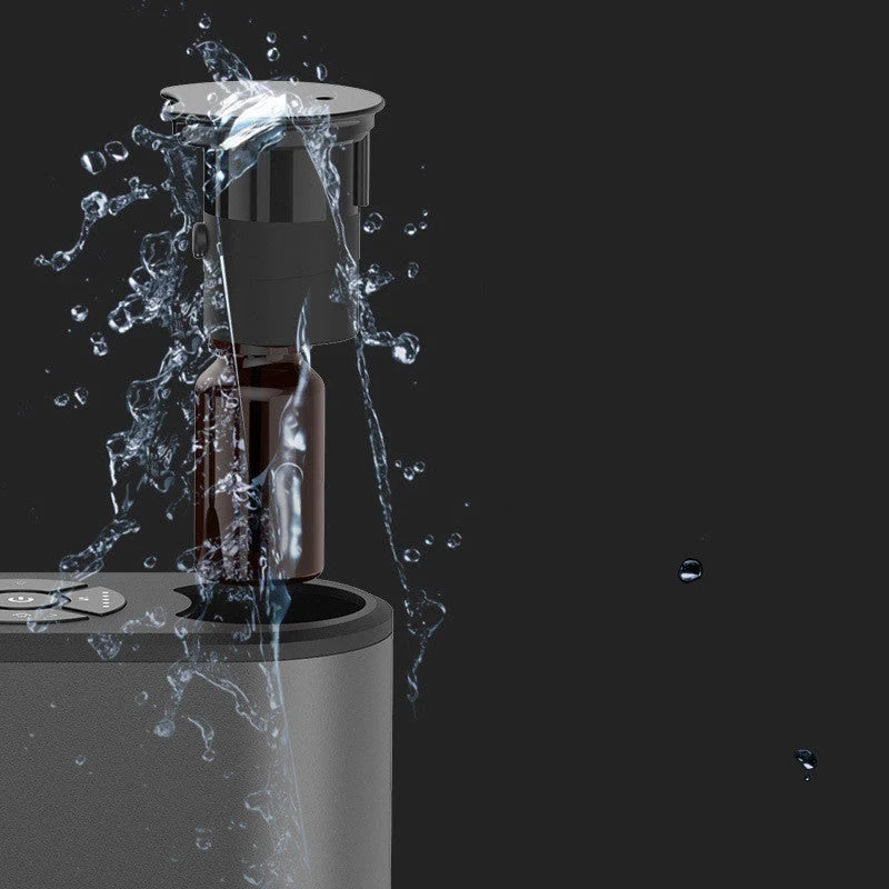 Rechargeable Double Sprinkler Essential Oil Expander in gun color, compact and efficient for large rooms