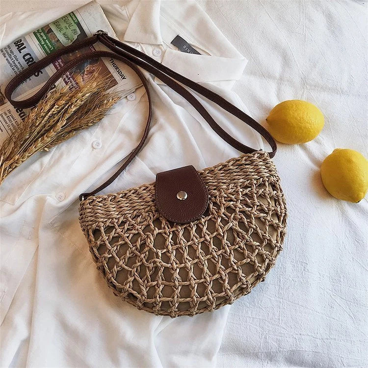 Trendy one-shoulder saddle straw bag with unique weaving detail