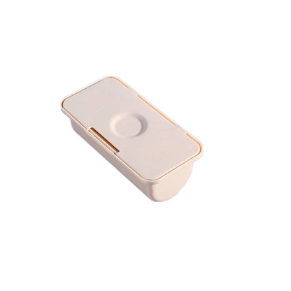 Wall-mounted plastic garbage bag holder in white, grey, and pink for kitchen organisation