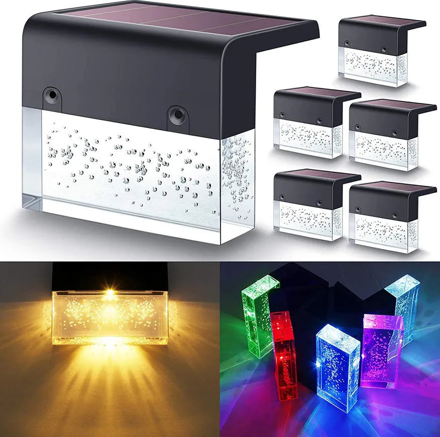 IP65 waterproof solar step light with crystal-like amber cover and RGB LED on a garden path