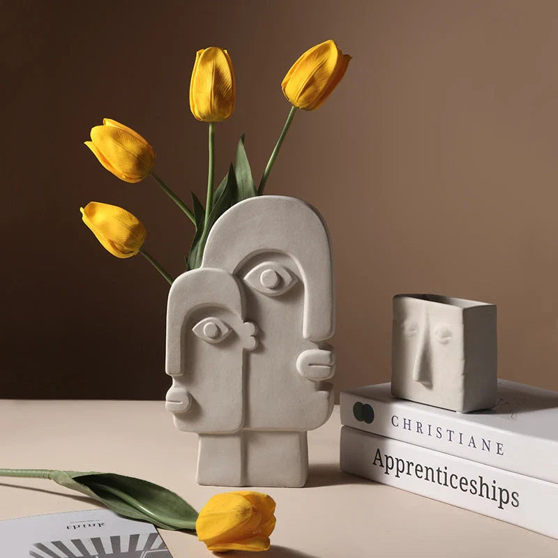 Stylish ceramic face vase with unique human-inspired designs, perfect for adding a touch of Kiwi charm to any living space