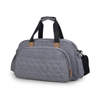 Convertible baby diaper bag in black and grey, transforming into a crib and changing table