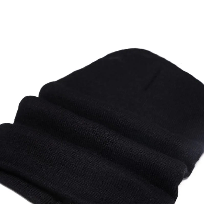 Unisex knitted winter beanie hat in black and grey colours all-size fit
