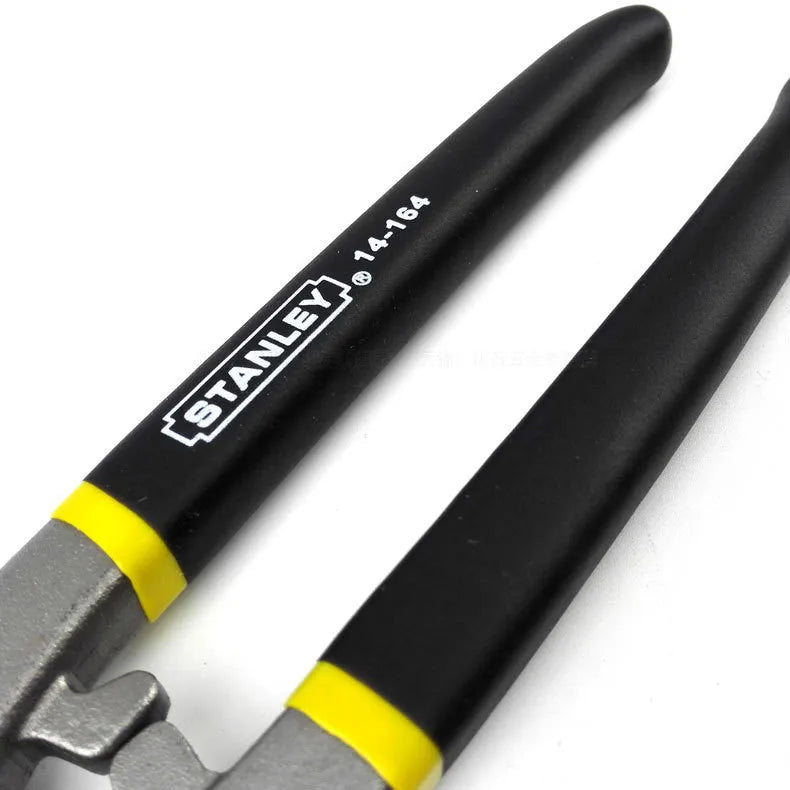 Yellow-handled high carbon steel barbed wire shears, 200mm long, on a workshop bench.