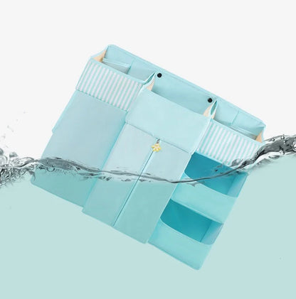 Universal baby crib hanging storage bag in durable Oxford cloth, available in multiple colours