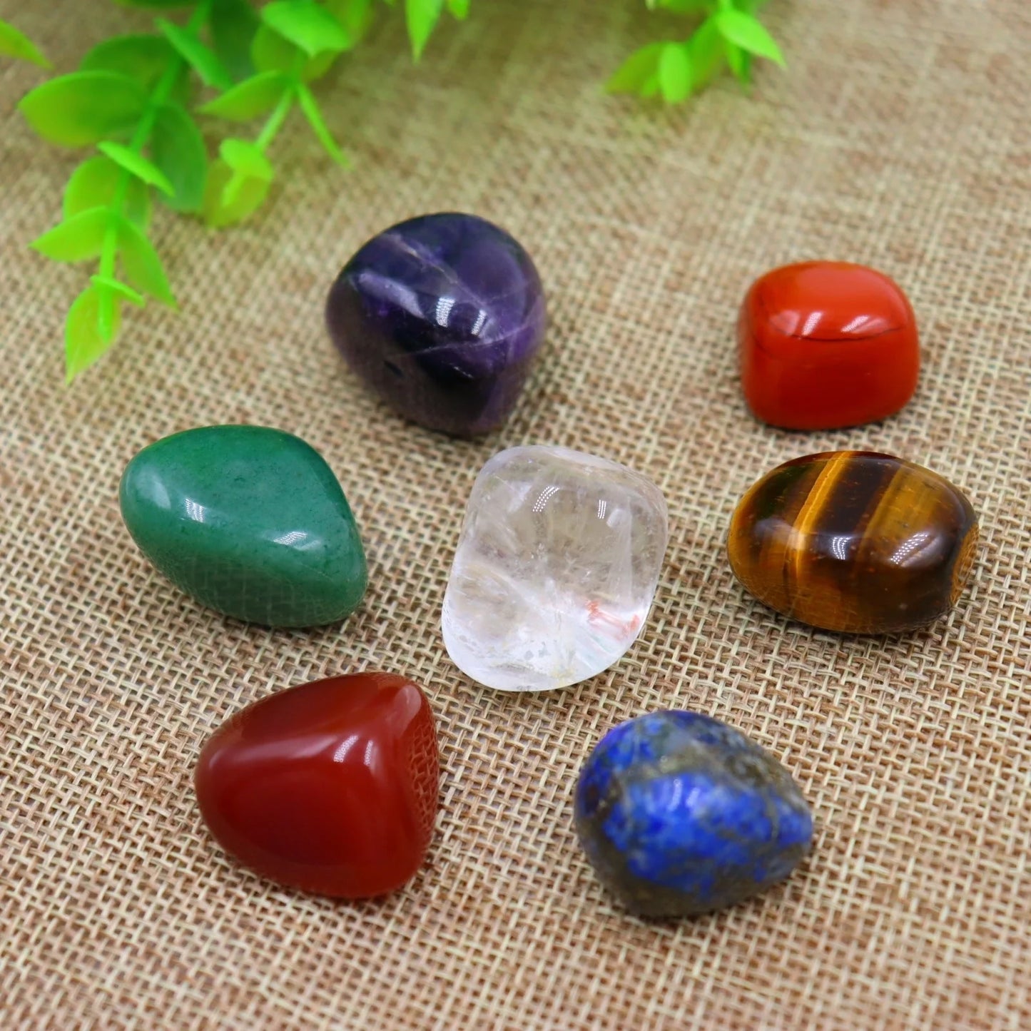 Seven Chakra Natural Stone Set with vibrant colors and black gift bag