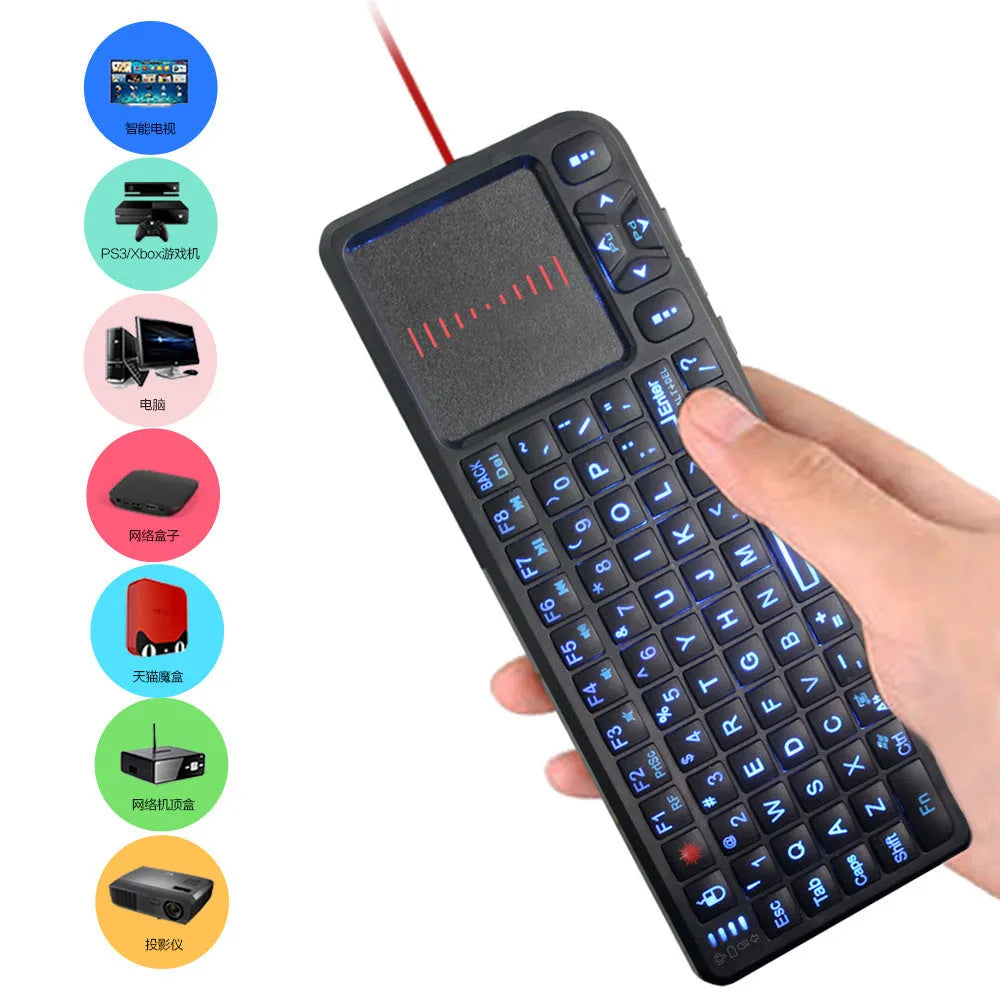 Black wireless mini keyboard with integrated touch screen and optical mouse, showing compact size.