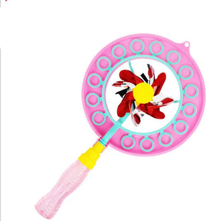 Kid playing with handheld windmill bubble blowing wand outdoors