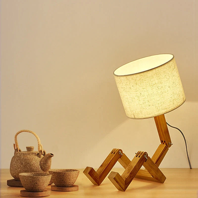 Robot shaped LED table lamp with flexible wooden base and linen shade