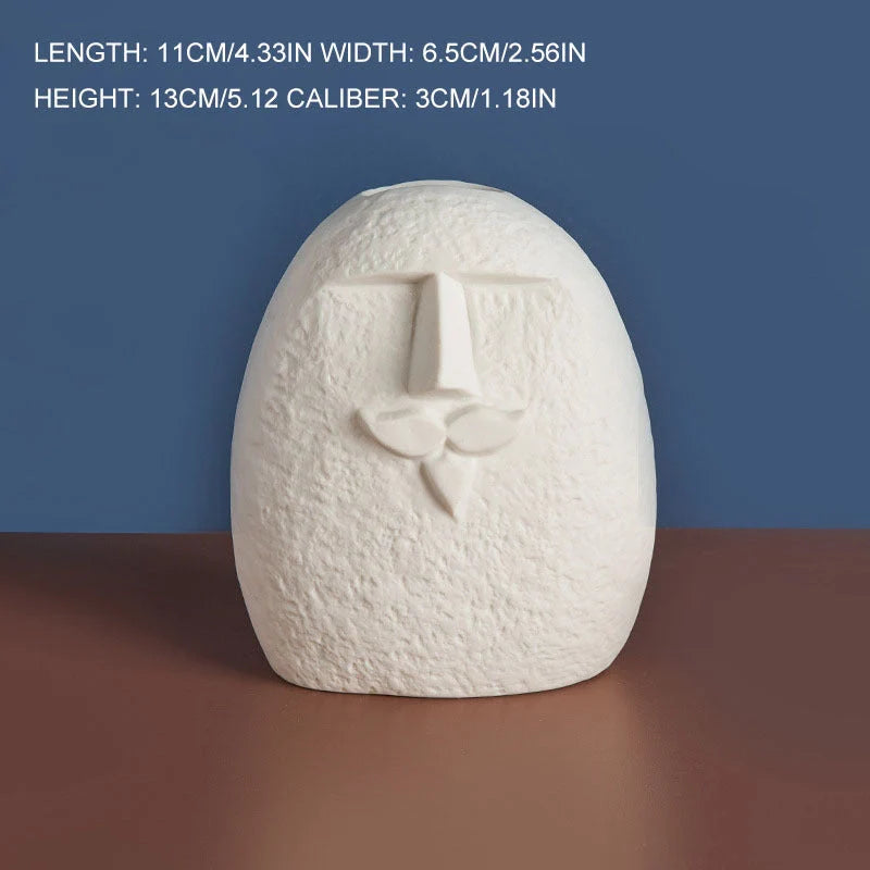 Ceramic face vase with unique expressions for home and office decoration