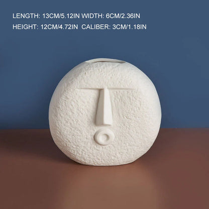 Ceramic face vase with unique expressions for home and office decoration