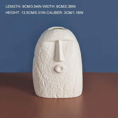 Ceramic face vase with unique expressions for home and office decoration