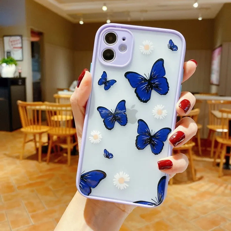 Pink acrylic iPhone case with a butterfly design and soft coloured edges.
