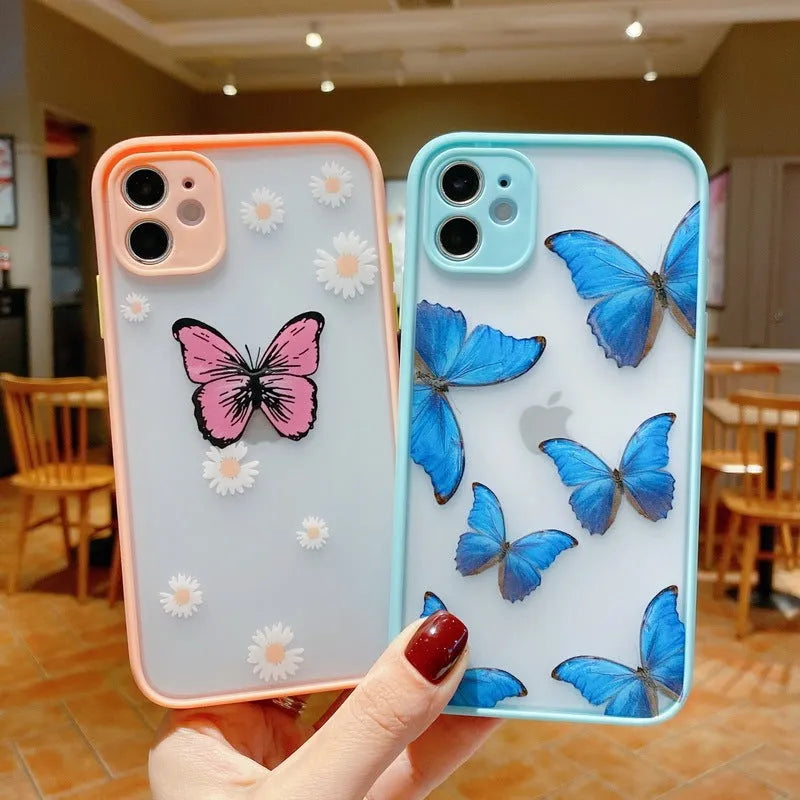 Pink acrylic iPhone case with a butterfly design and soft coloured edges.
