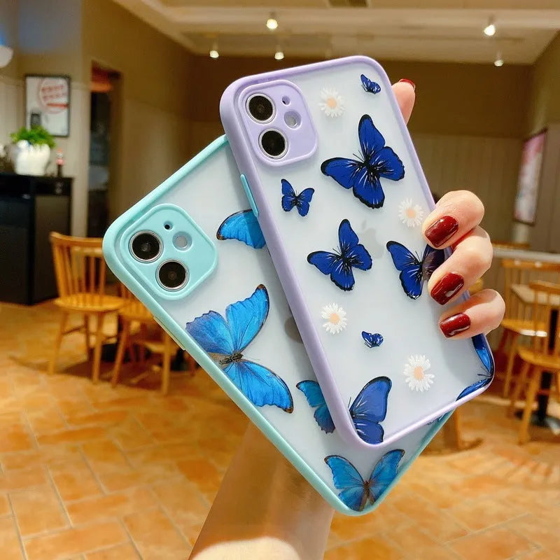 Pink acrylic iPhone case with a butterfly design and soft coloured edges.