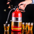 2L clear acrylic fire extinguisher-shaped beverage dispenser with hand-press pump on a party table