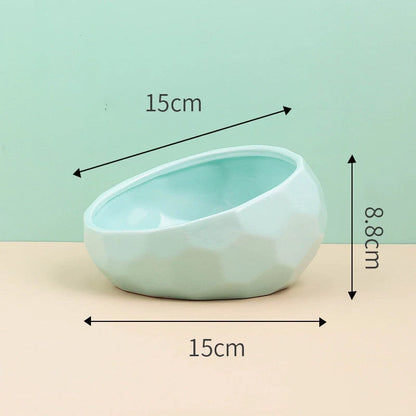 Ceramic pet bowl with oblique mouth design for cats and dogs, available in multiple colours