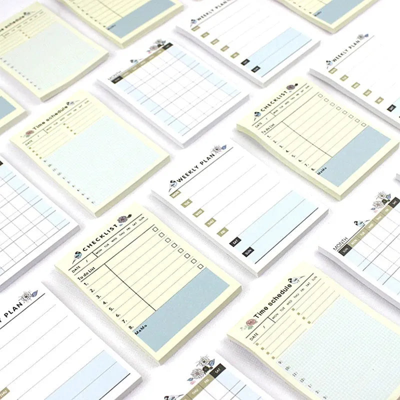 Compact work plan diary notebook showing four design options for weekly and monthly planning