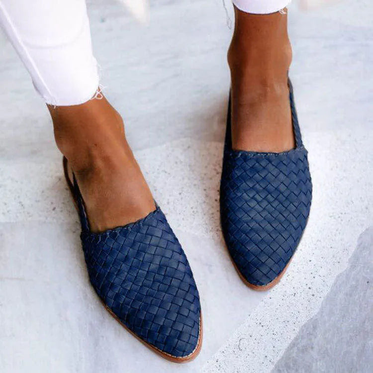 Baotou flat sandals with a buckle fastening and pointed toe, shown in a selection of colours.