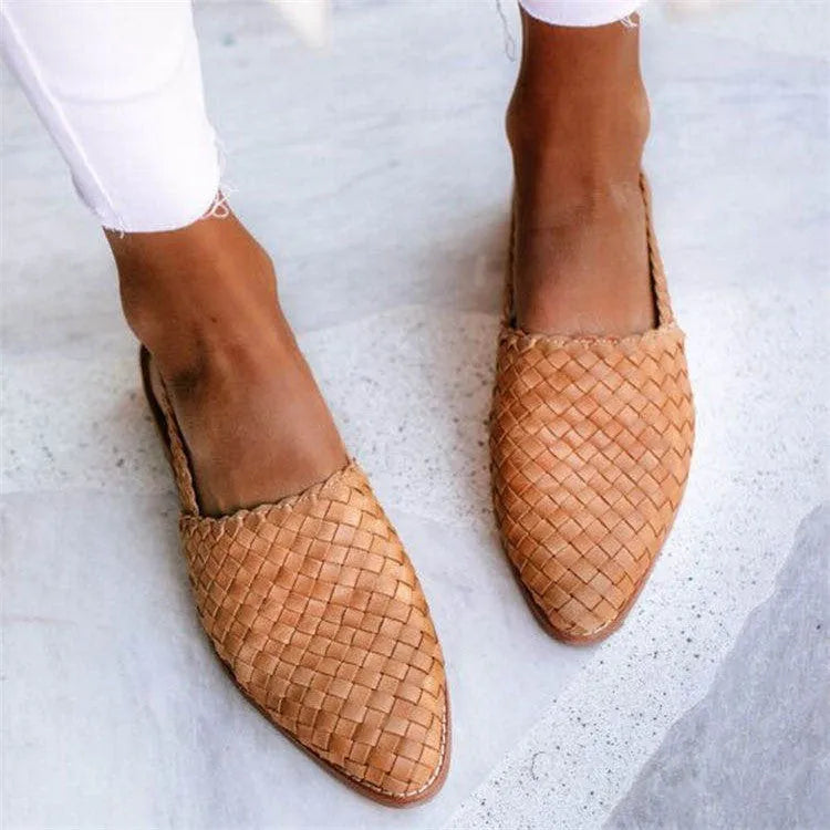 Baotou flat sandals with a buckle fastening and pointed toe, shown in a selection of colours.