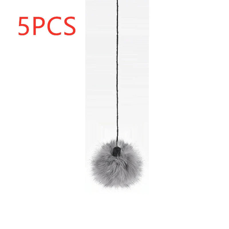 Electronic motion cat toy with real fur ball for interactive play