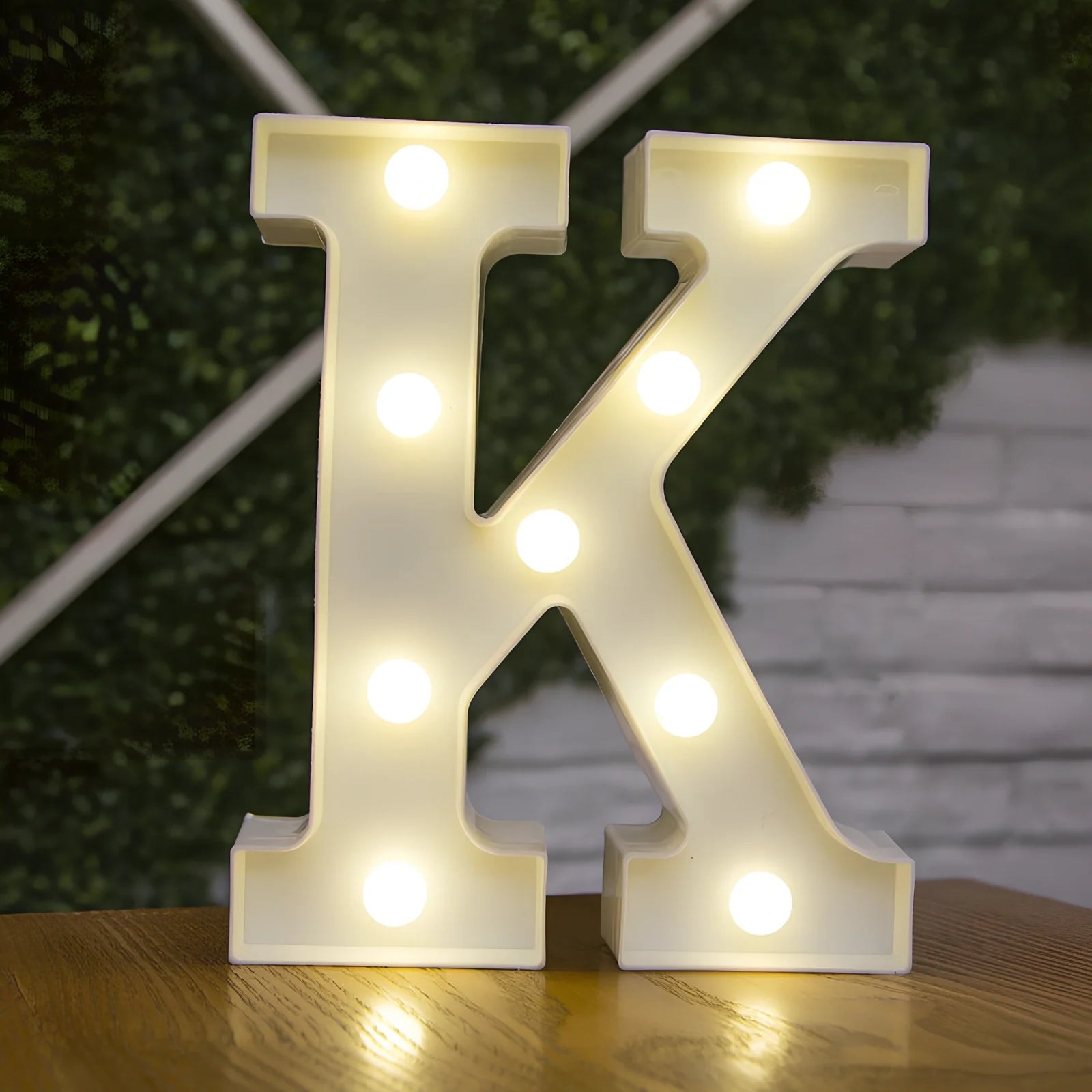 White plastic LED alphabet marquee sign with warm white illumination, 22cm height with battery operation